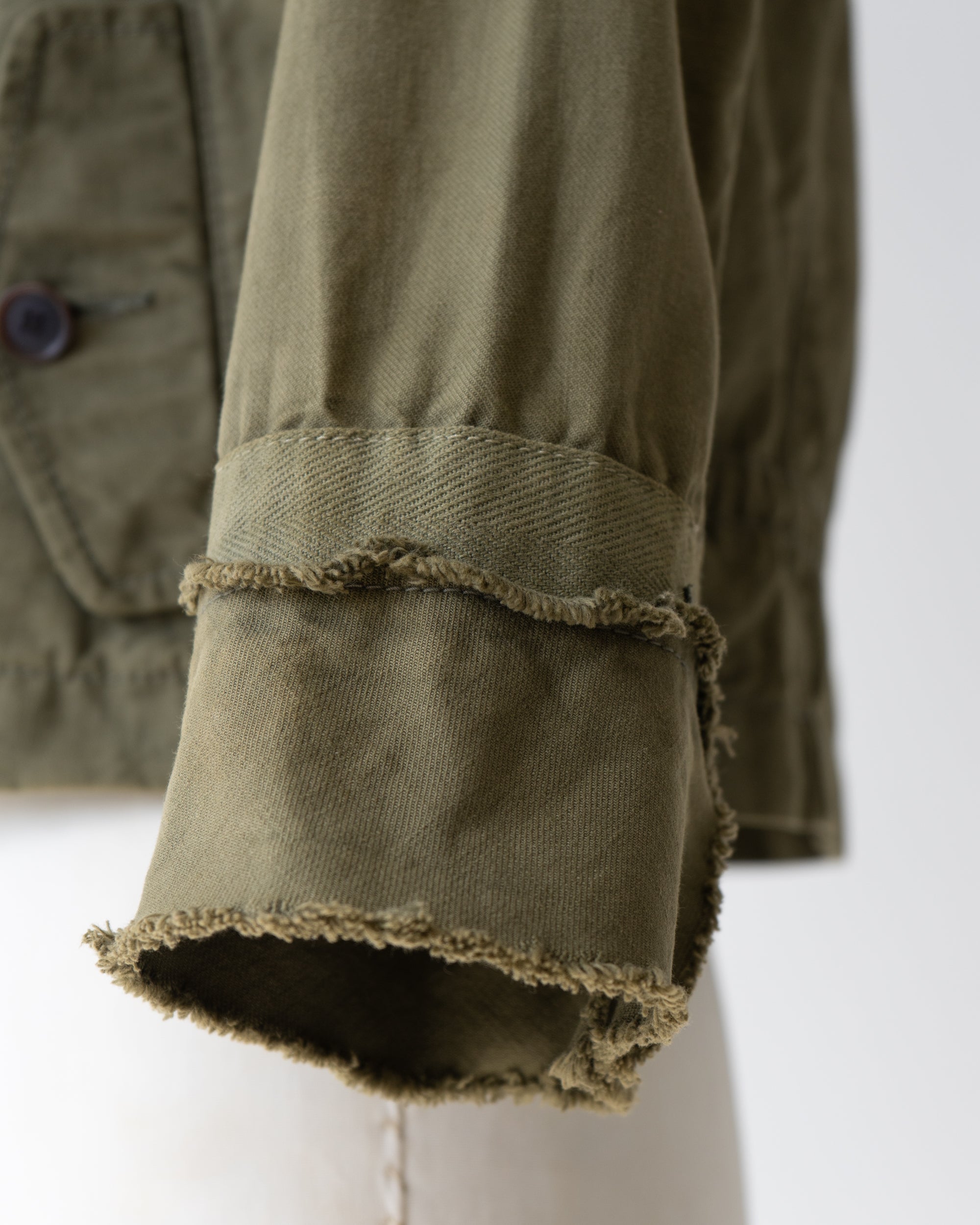 〈tricot COMME des GARCONS〉Cut-off Military Jacket