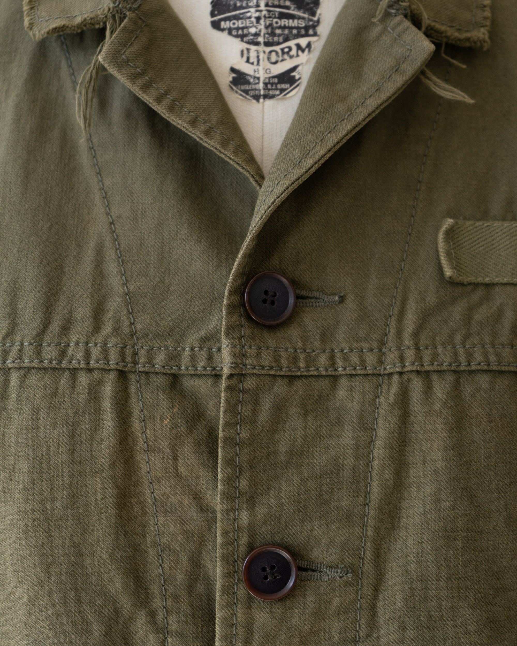 〈tricot COMME des GARCONS〉Cut-off Military Jacket