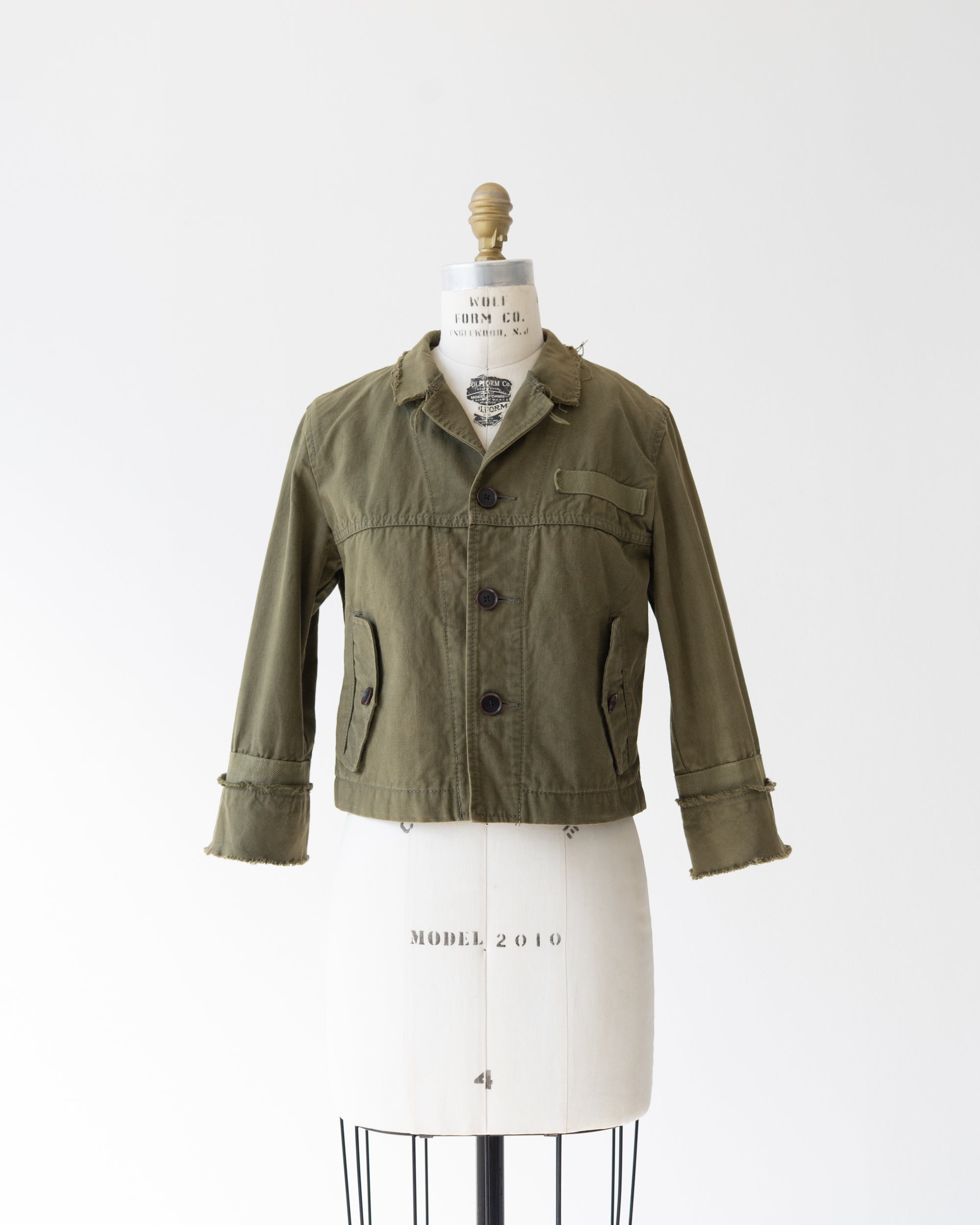 〈tricot COMME des GARCONS〉Cut-off Military Jacket