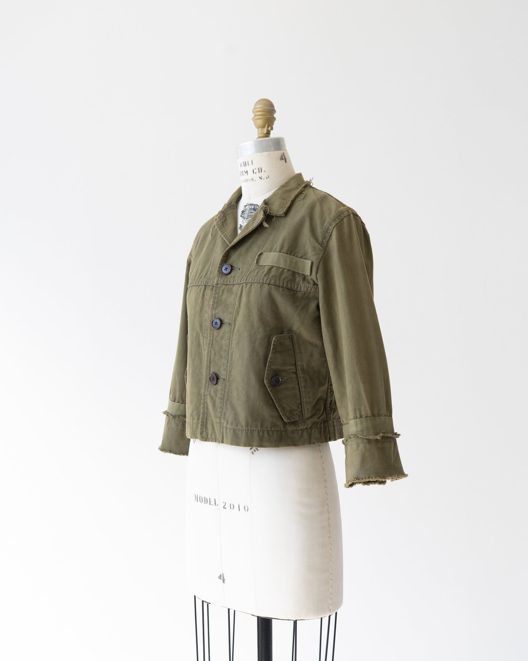 〈tricot COMME des GARCONS〉Cut-off Military Jacket